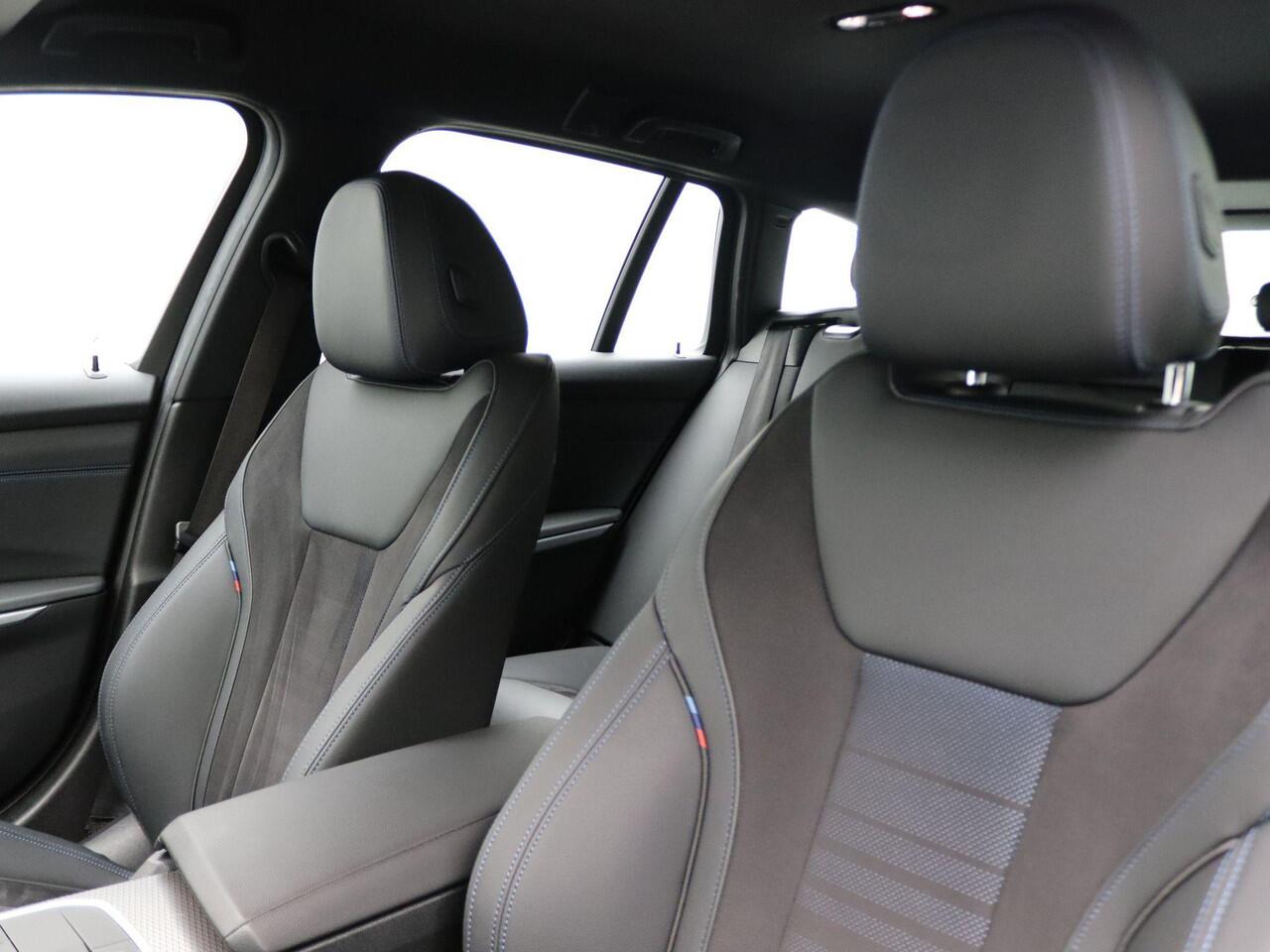 BMW 3-SERIE Touring 320e M Sportpakket | Entertainment Pack | Sportstoelen | Cruise Control | DAB | Harman Kardon | 18''