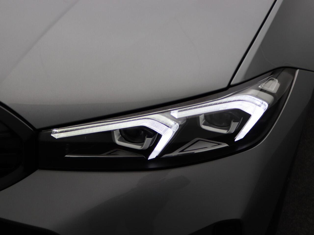 BMW 3-SERIE Sedan M340i xDrive Comfort Pack | Stuurwielrand Verwarmd | Comfort Access | Achteruitrijcamera | Parking Assistant | DAB | HiFi | 19''