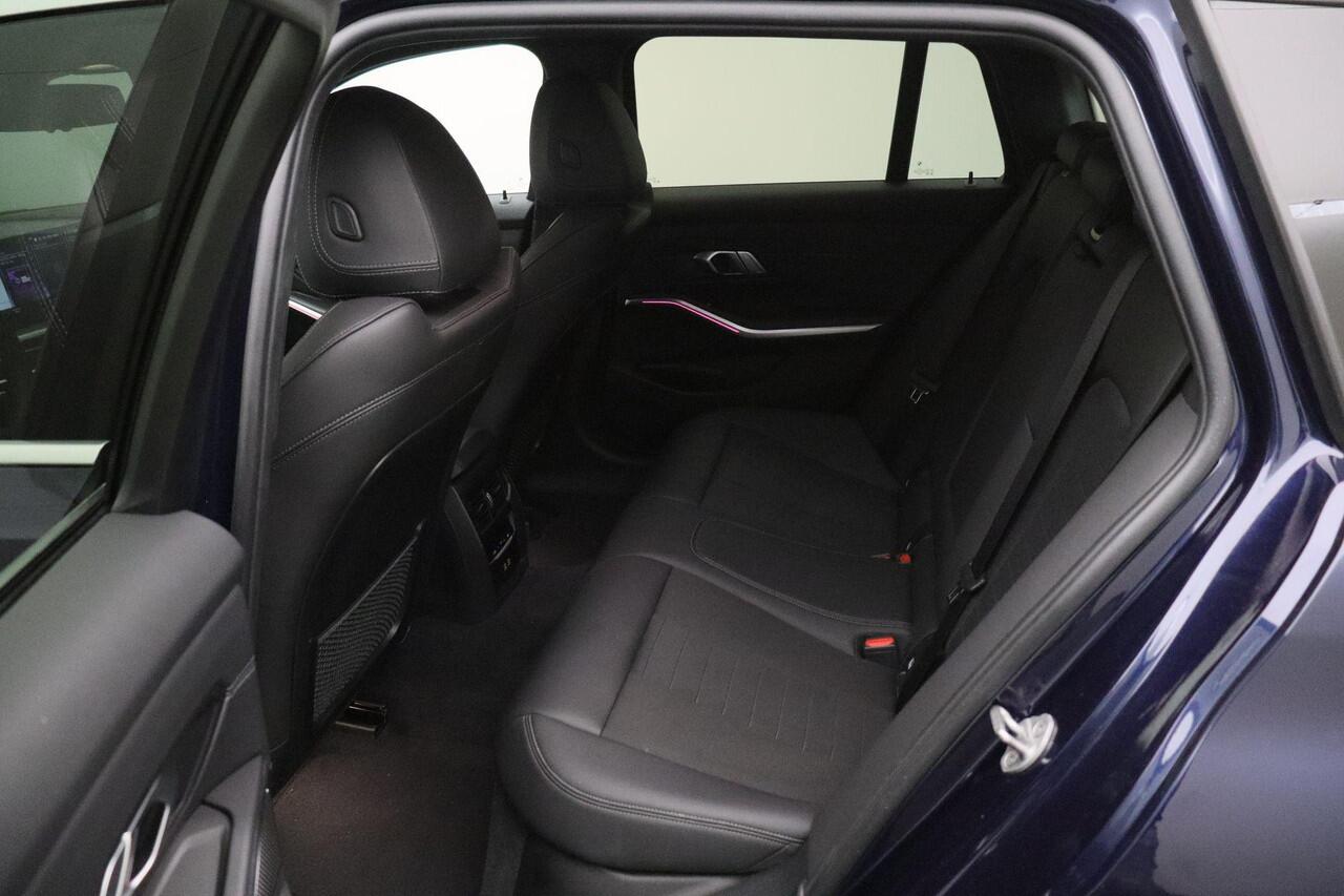 BMW 3-SERIE Touring 320e 2023 | Connected Services | Carplay | DAB Radio | Stuurverwarming | Adaptive Cruise Control | Boekjes | Keyless 2 Sleutels | Elektrische Trekhaak & Achterklep | Navigatie | Stuurwiel Bediening