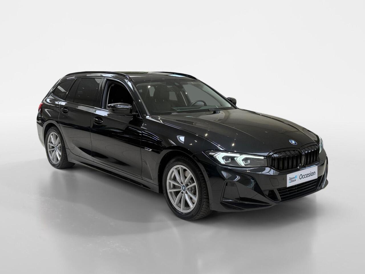 BMW 3-SERIE Touring 320e | Leder | Dealer onderhouden | Blackpack | Virtual cockpit | Camera |