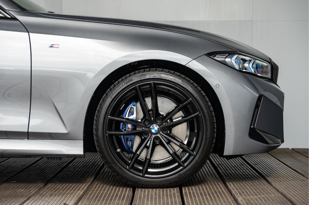 BMW 3-SERIE Sedan 320i M Sportpakket / HiFi systeem / Draadloos oplaadstation / Active Cruise Controle /