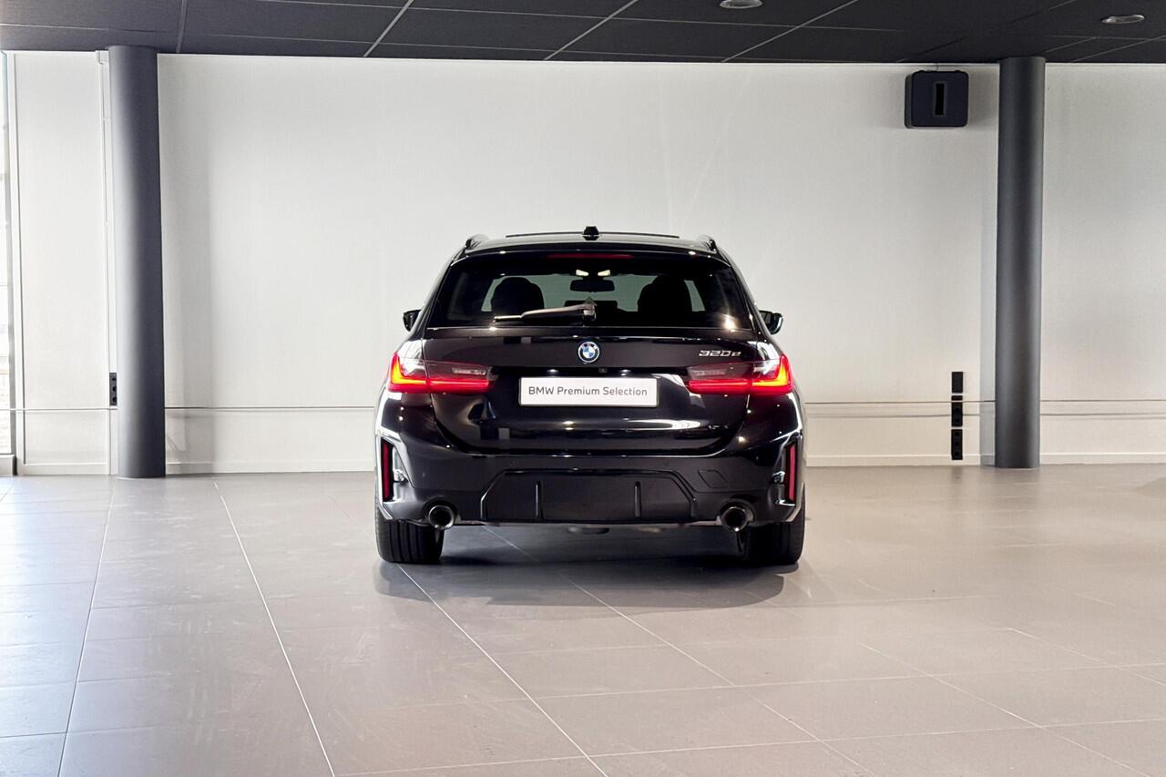 BMW 3-SERIE Touring 320e | M Sport | Glazen Panoramadak | Stoelverwarming | Comfort Access | HIFI |