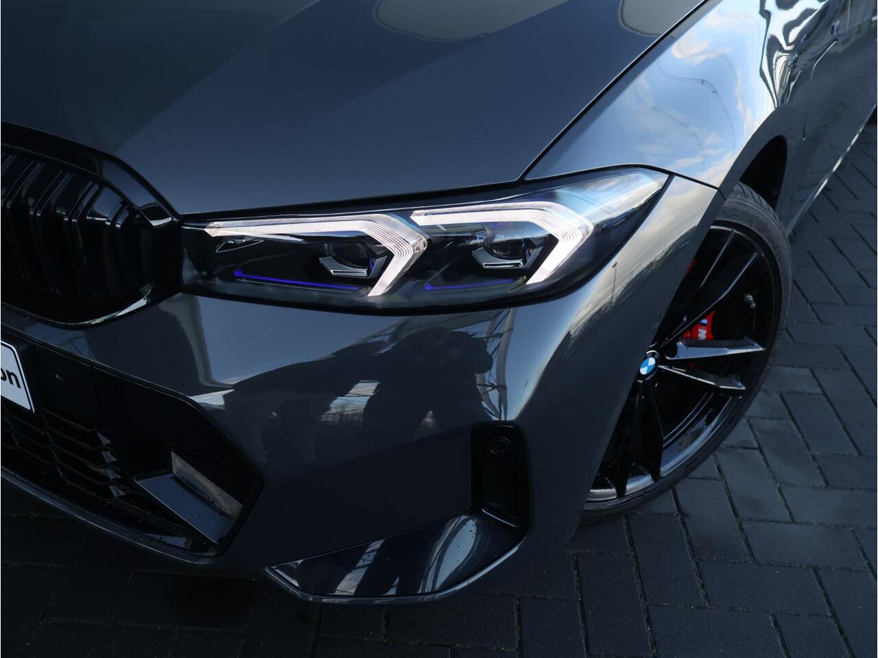 BMW 3-SERIE Touring 320e M Sportpakket Pro/ Stuurwielrand verwarmd/ Elektrische Trekhaak/ Achteruitrijcamera/ Panoramadak/ HiFi/ Stoelverwarming