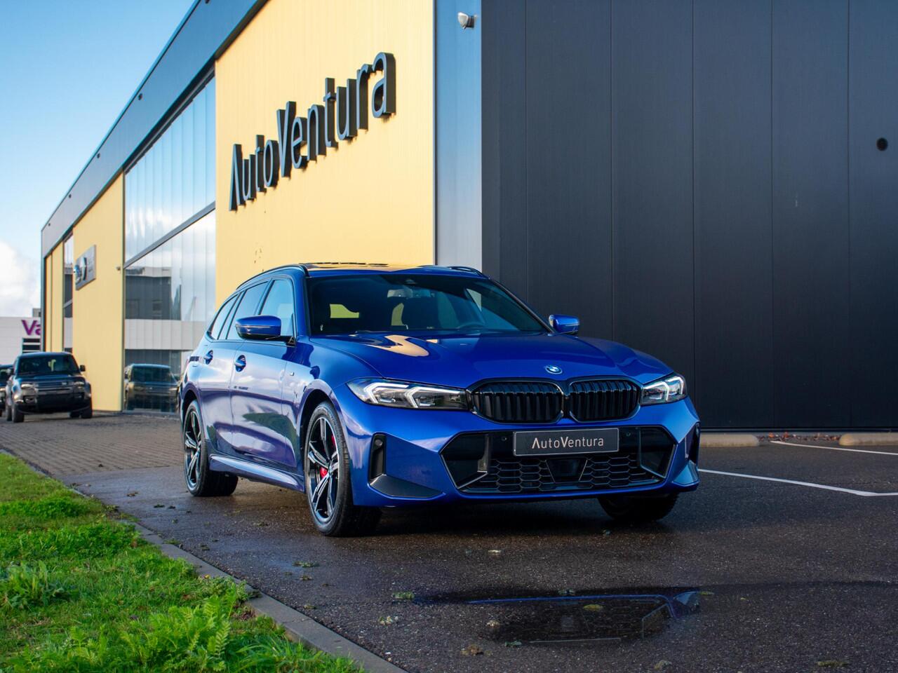 BMW 3-SERIE Touring 330e l M-sport l Long Range l Trekhaak l Schuif-/kantel dak l Adaptive LED l Verwarmd Stuurwiel l Head-Up l