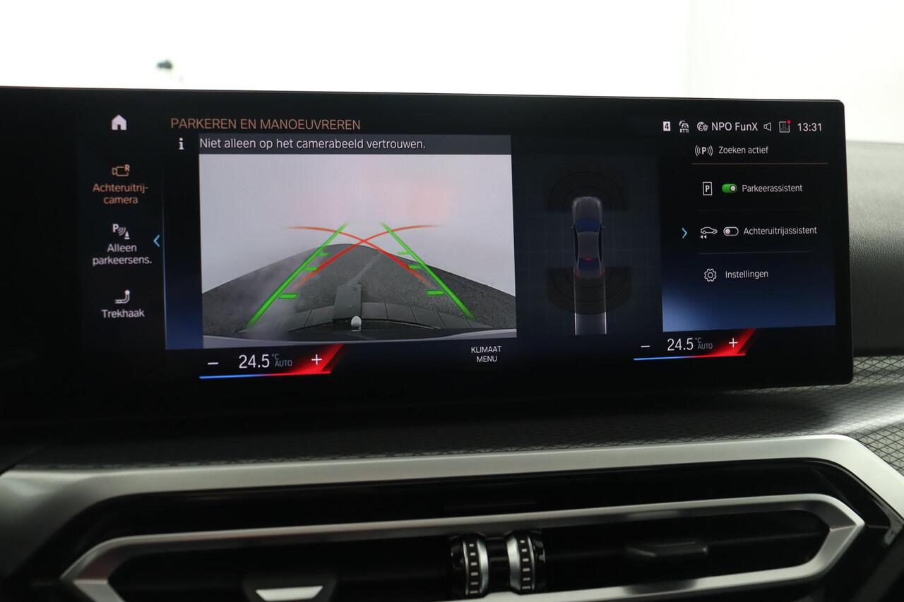 BMW 3-SERIE 320e BMW 320e Sedan M Sport | Glazen Schuif-/kanteldak | Trekhaak Elektrisch | Harman Kardon | Active Cruise Control | Stoelverwarming | 19" M Dubbelspaak