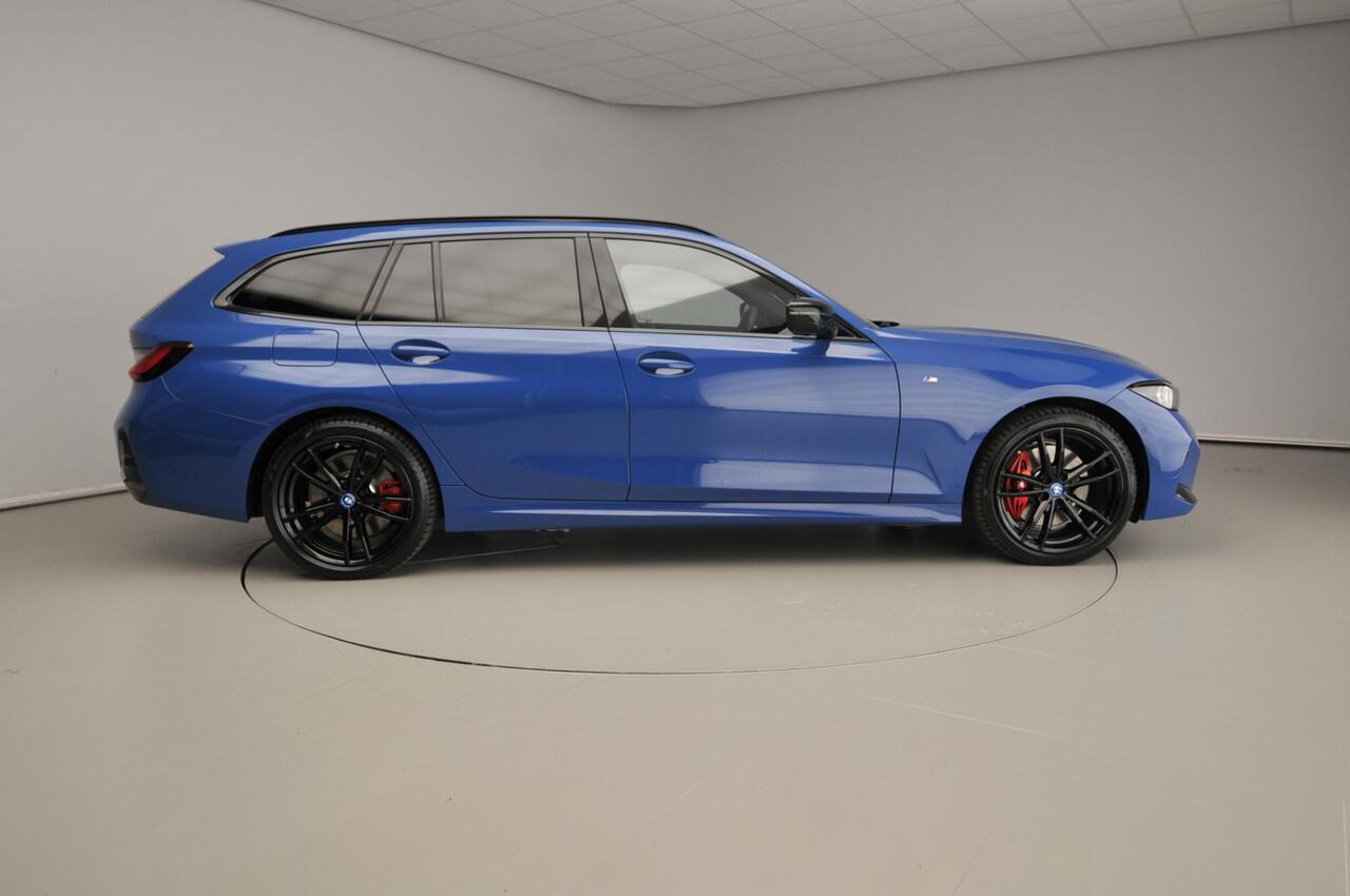 BMW 3-SERIE Touring 330e | Individual Lak | M-Sportpakket | LED | HUD | Trekhaak | Elektr. zetels | DAB | Harman-kardon sound | Alu 19 inch
