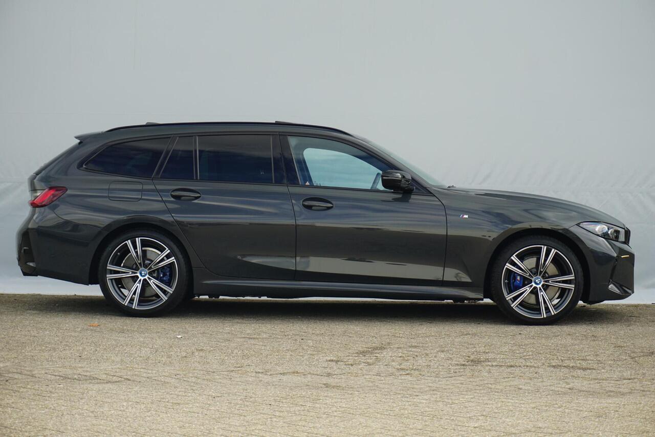 BMW 3-SERIE Touring 320e M Sportpakket Pro 19'' / Panoramadak / Harman Kardon / Elektrisch verstelbare stoelen / Comfort Access