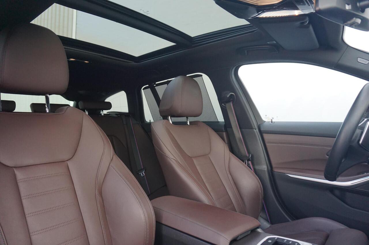 BMW 3-SERIE Touring 320e M Sportpakket Pro 19'' / Panoramadak / Harman Kardon / Elektrisch verstelbare stoelen / Comfort Access