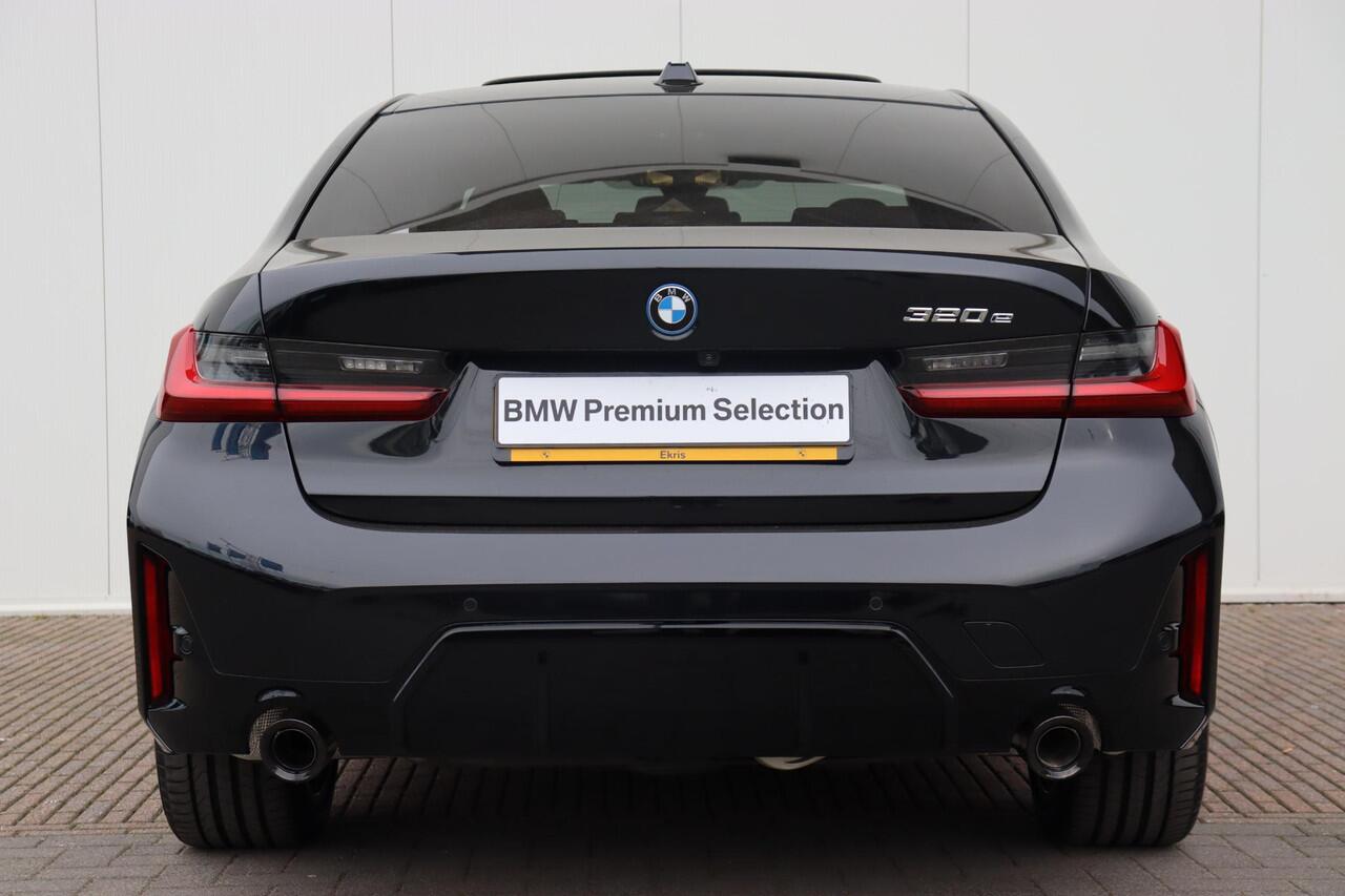 BMW 3-SERIE 320e M Sportpakket/ Elektrische Trekhaak/ schuif-/kanteldak/ Sportstoelen/ Verwarmd Stuurwiel | Ekris Selection