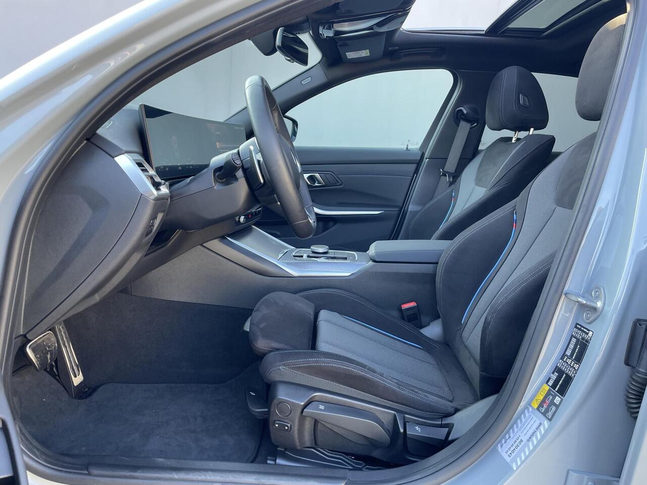 BMW 3-SERIE 330e M Sport Edition / Fabrieksgarantie t/m 6-2028 / Elektrische Trekhaak (1500 KG) / Adaptieve Cruise Control / Stoel-/Stuurverwarming / Brooklyn Grau / Sportstoelen / Apple Carplay/Android auto / Schuif-/kanteldak /