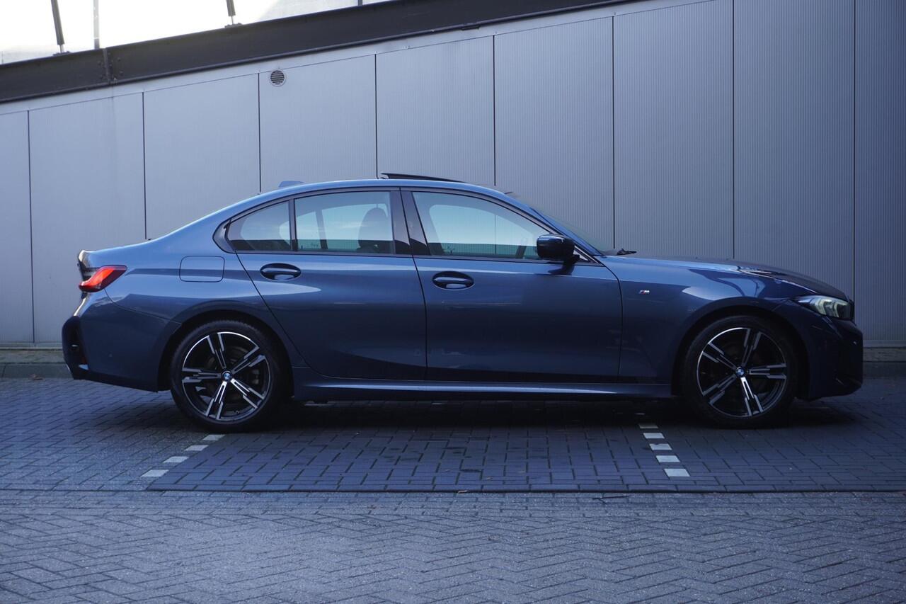 BMW 3-SERIE Sedan 318i M Sportpakket | Comfort Pack | Elektrisch bediend glazen schuif-/kanteldak | Achteruitrijcamera | Elektrisch verwarmde voorstoelen