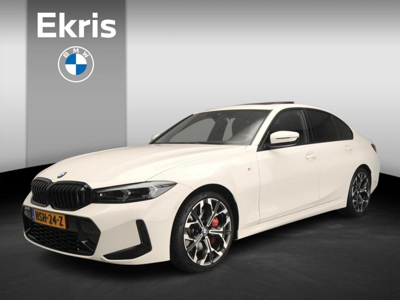 BMW 3-SERIE Sedan 318i | M-Sportpakket | Navigatie | Trekhaak | Schuifdak | Stoelverwarming | Keyles go | DAB | Alu 19 inch