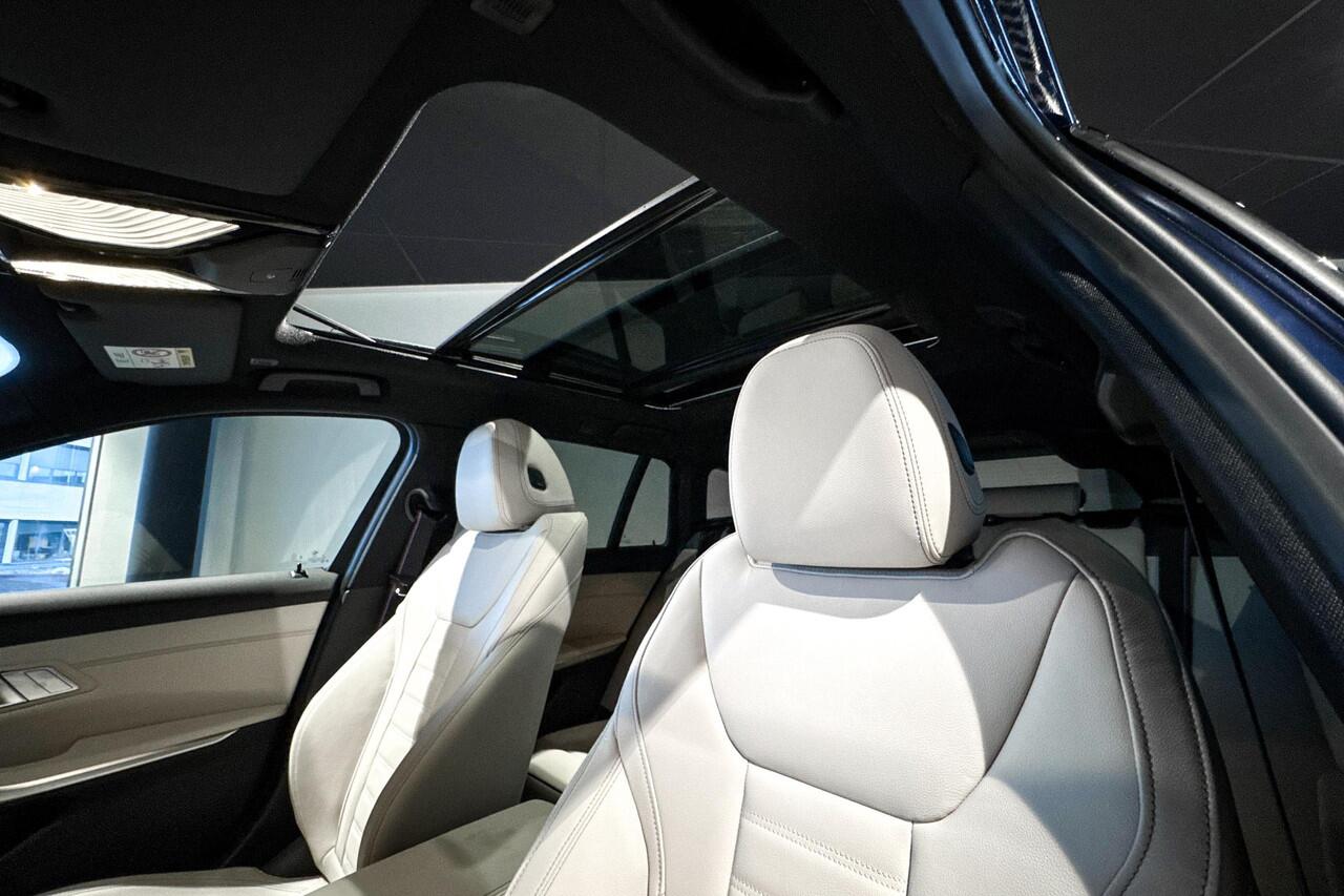 BMW 3-SERIE Touring 330e | M Sport Pro | Glazen Panoramadak | Harman Kardon | Trekhaak |