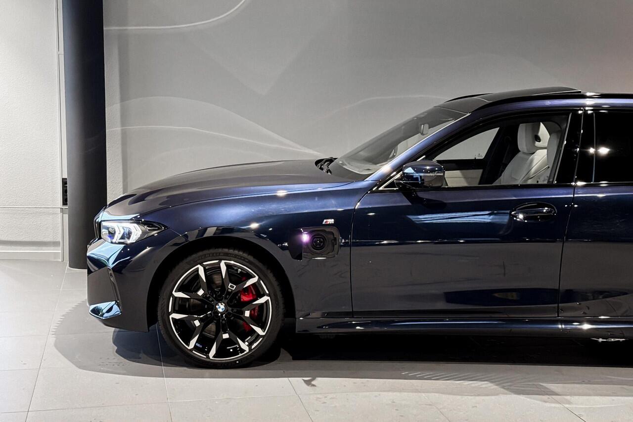 BMW 3-SERIE Touring 330e | M Sport Pro | Glazen Panoramadak | Harman Kardon | Trekhaak |