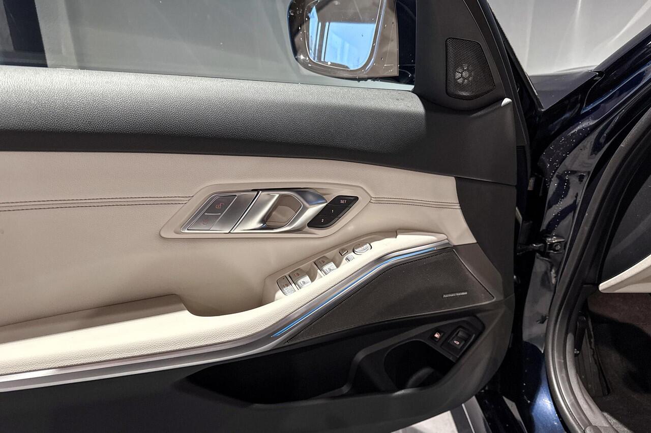 BMW 3-SERIE Touring 330e | M Sport Pro | Glazen Panoramadak | Harman Kardon | Trekhaak |