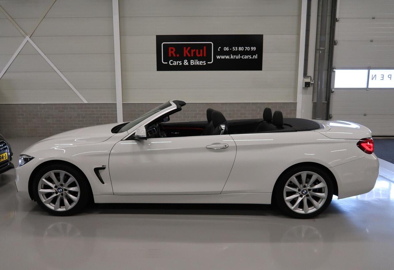BMW 4-SERIE Cabrio 420i Sportline Leer Nekverwarming Sportstoelen Zeer nette auto Boekjes aanwezig Harman/Kardon PDC Lage kilometerstand Stuurwiel verwarmd Airco-ecc Cruise control LED Bluetooth Sportline