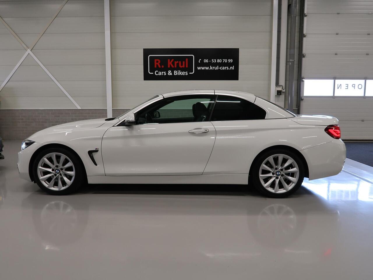 BMW 4-SERIE Cabrio 420i Sportline Leer Nekverwarming Sportstoelen Zeer nette auto Boekjes aanwezig Harman/Kardon PDC Lage kilometerstand Stuurwiel verwarmd Airco-ecc Cruise control LED Bluetooth Sportline