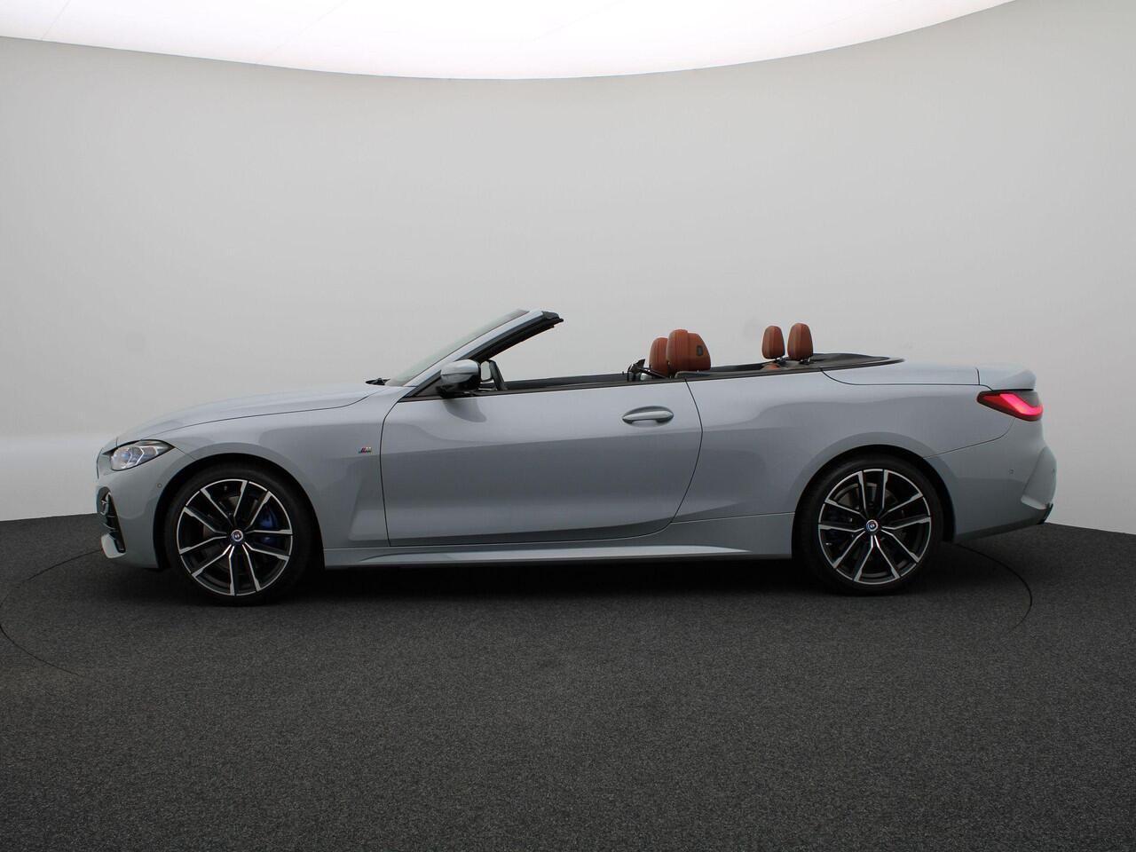 BMW 4-SERIE Cabrio M440i xDrive M Sportpakket | Laserlicht | Stuurwielverwarming | Nekverwarmer | Head-Up Display | 19"