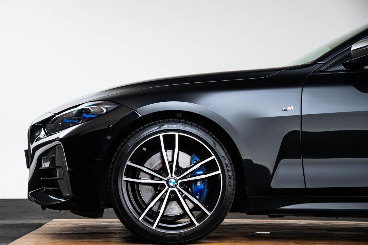 BMW 4-SERIE Cabrio M440i High Executive Parking/Driving Assistant - Active Guard Plus - Head up - Ambiance verlichting - Comfort Access - Air collar - Windscherm - Automatisch dimmende binnen/buitenspiegel -