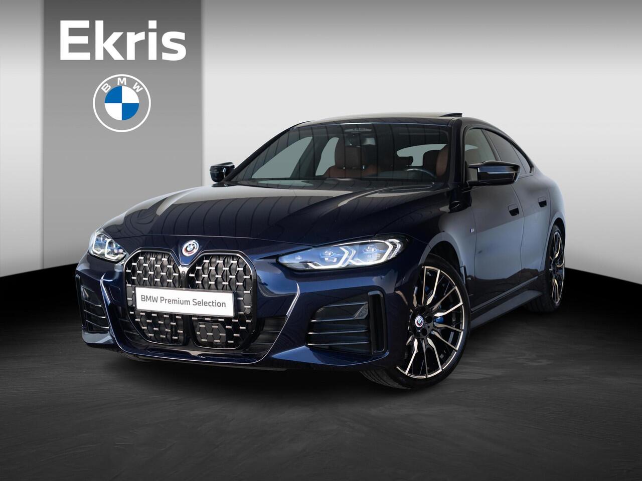 BMW 4-SERIE Gran Coupé | M440i | High Executive | M Sportpakket | Glazen schuif-/kanteldak | 20 inch | Driving Assistent Professional | Trekhaak | Harman Kardon | Head Up Display