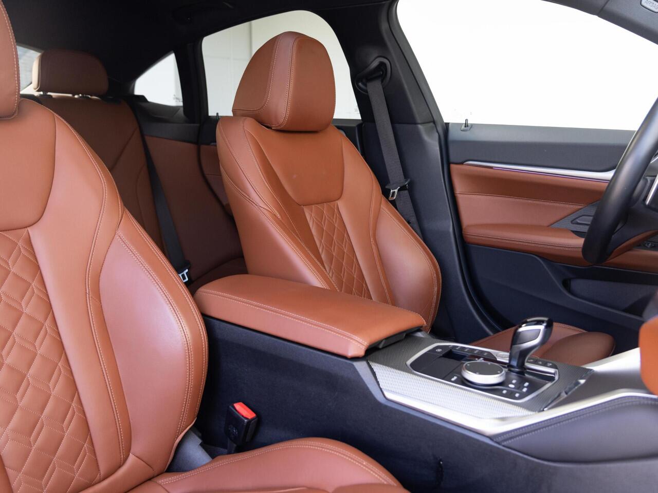 BMW 4-SERIE Gran Coupé | M440i | High Executive | M Sportpakket | Glazen schuif-/kanteldak | 20 inch | Driving Assistent Professional | Trekhaak | Harman Kardon | Head Up Display