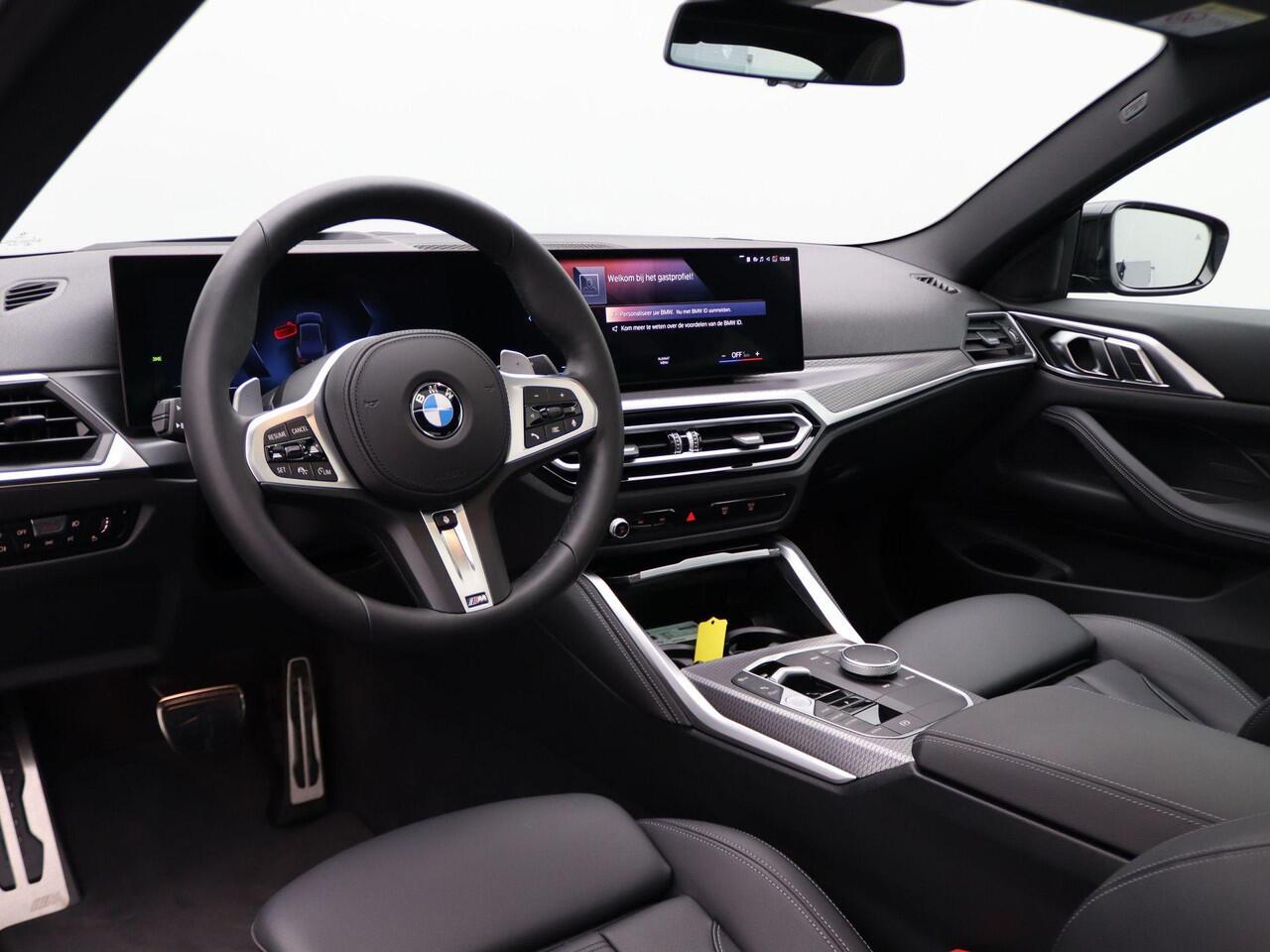 BMW 4-SERIE Coupé 420i High Executive | M Sportpakket | Safety Pack | Stuurwielrand Verwarmd | Schuifdak | Driving Assistant | DAB | HiFi | 19''