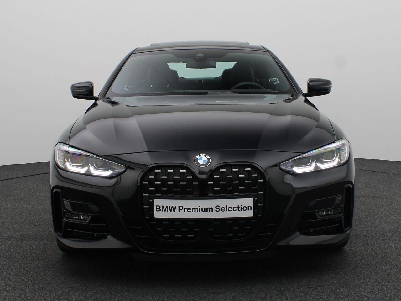 BMW 4-SERIE Coupé 420i High Executive | M Sportpakket | Safety Pack | Stuurwielrand Verwarmd | Schuifdak | Driving Assistant | DAB | HiFi | 19''