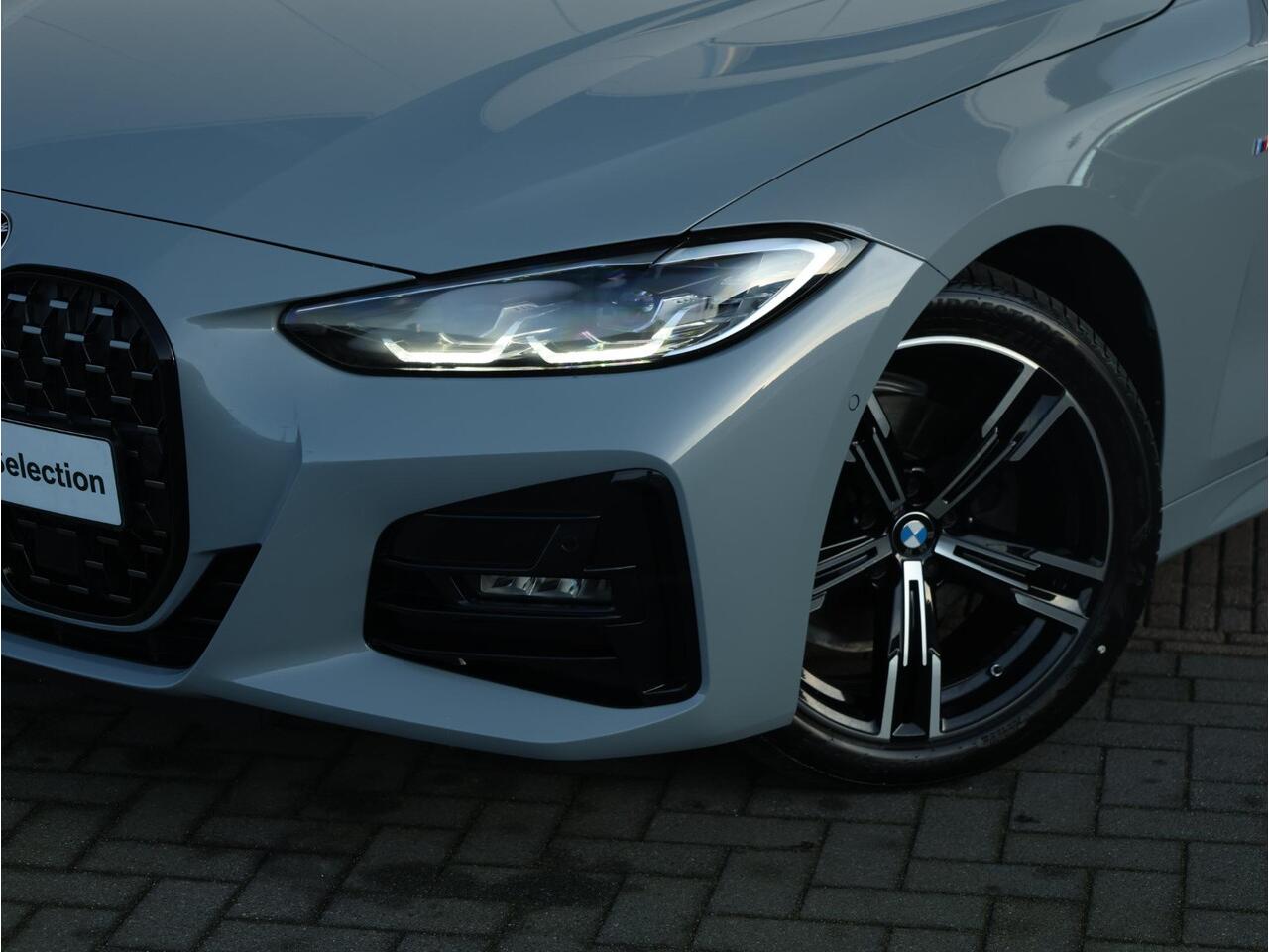 BMW 4-SERIE Cabrio 420i High Executive M Sportpakket/ Verwarmd Stuurwiel/ Comfort Access/ Achteruitrijcamera/ Stoelverwarming/ Active Cruise Control/ HiFi