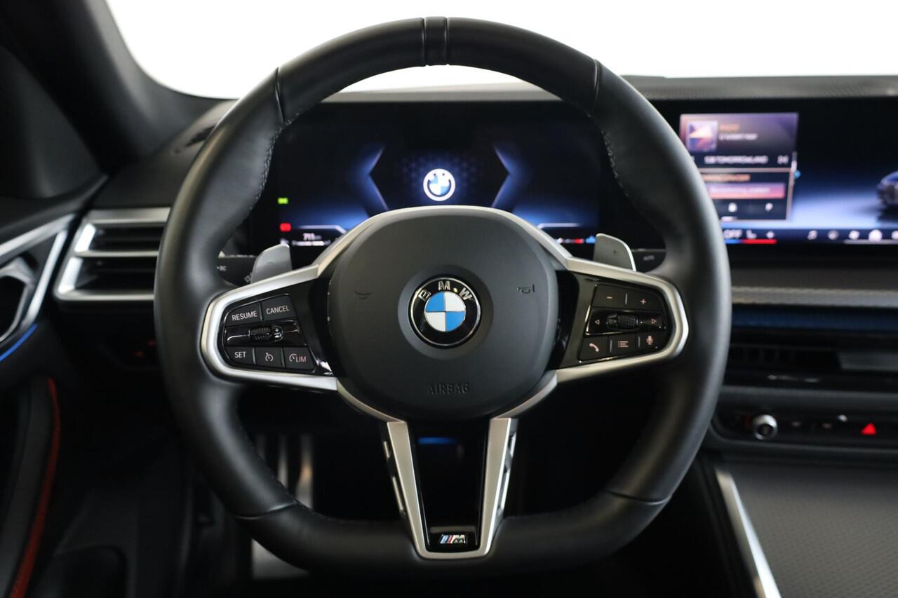 BMW 4-SERIE Gran Coupé 420i | M Sportpakket | Glazen schuif-/kanteldak | Leder | Stoelverwarming voor én achter | Camera | 18 M Aerodynamisch