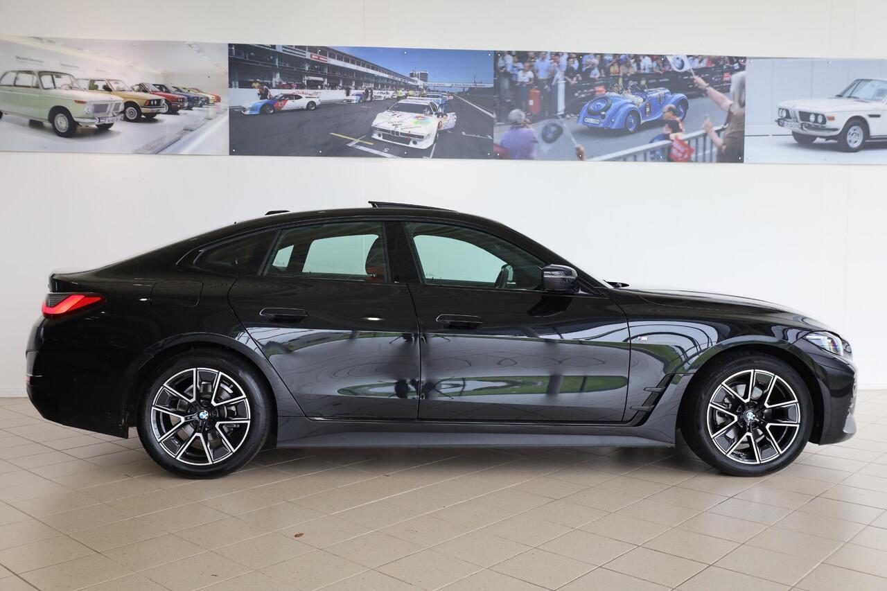 BMW 4-SERIE Gran Coupé 420i | M Sportpakket | Glazen schuif-/kanteldak | Leder | Stoelverwarming voor én achter | Camera | 18 M Aerodynamisch