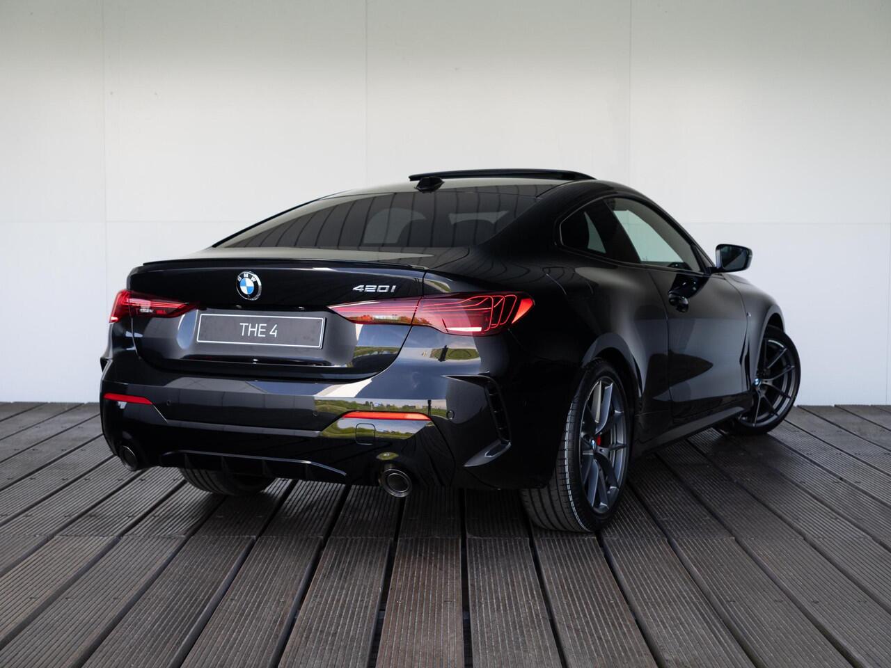 BMW 4-SERIE 420i Coupé M Sport Pro | Schuif-/kanteldak | Harman Kardon | Stoel en Stuurwiel verwarming | Comfort Access | Elektrische achterklep | Ekris Selection