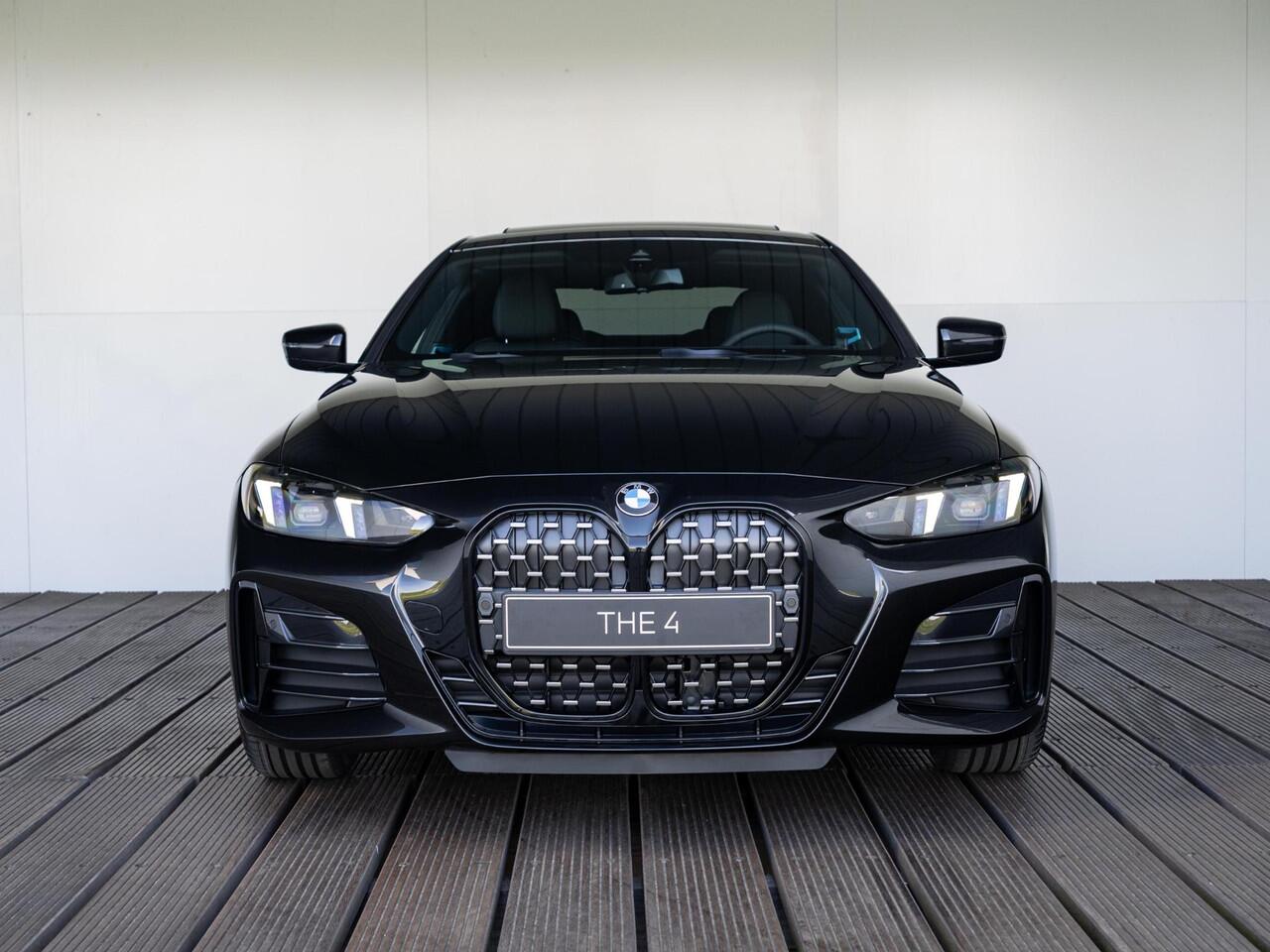 BMW 4-SERIE 420i Coupé M Sport Pro | Schuif-/kanteldak | Harman Kardon | Stoel en Stuurwiel verwarming | Comfort Access | Elektrische achterklep | Ekris Selection