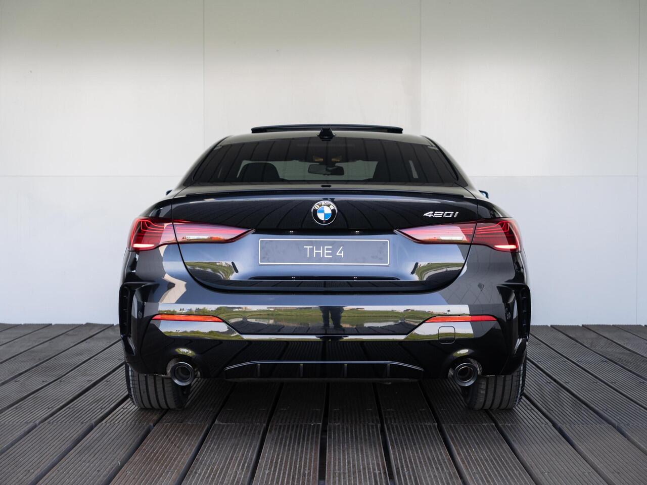 BMW 4-SERIE 420i Coupé M Sport Pro | Schuif-/kanteldak | Harman Kardon | Stoel en Stuurwiel verwarming | Comfort Access | Elektrische achterklep | Ekris Selection