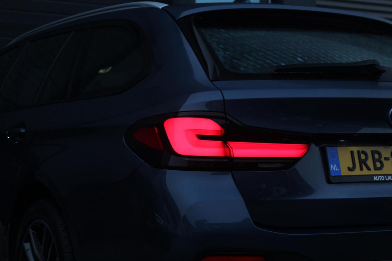 BMW 5-SERIE Touring 530e M-Sport | Stuur en Stoelverwarming | Sfeerverlichting