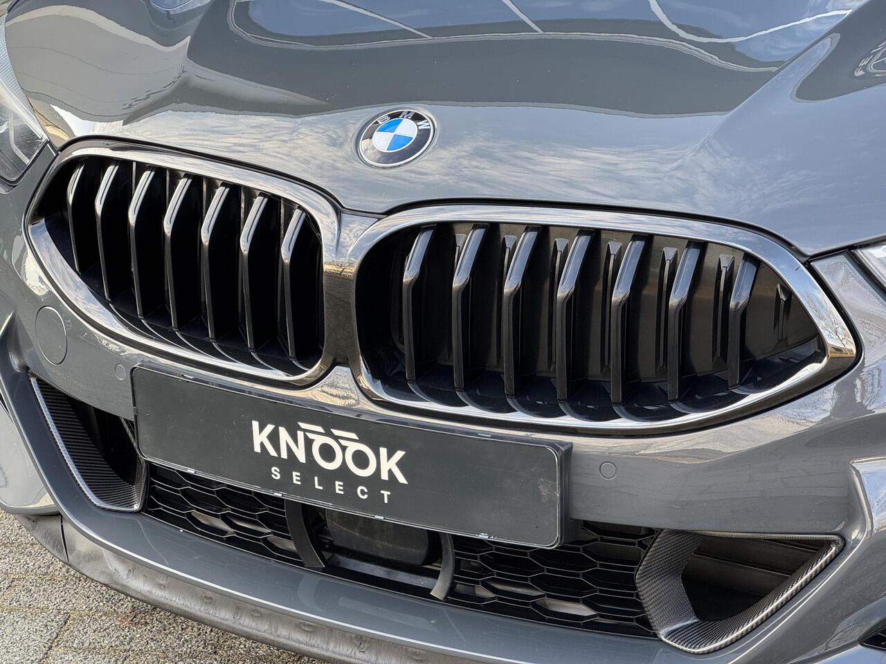 BMW 8-SERIE M850i xDrive High Executive / 20 Inch / Active Cruise control / M Carbon exterieur / Soft close / Integrale Active Steering / Laserlicht / M Sport differentieel / Adaptieve Cruise Control / Live Cockpit Professional /