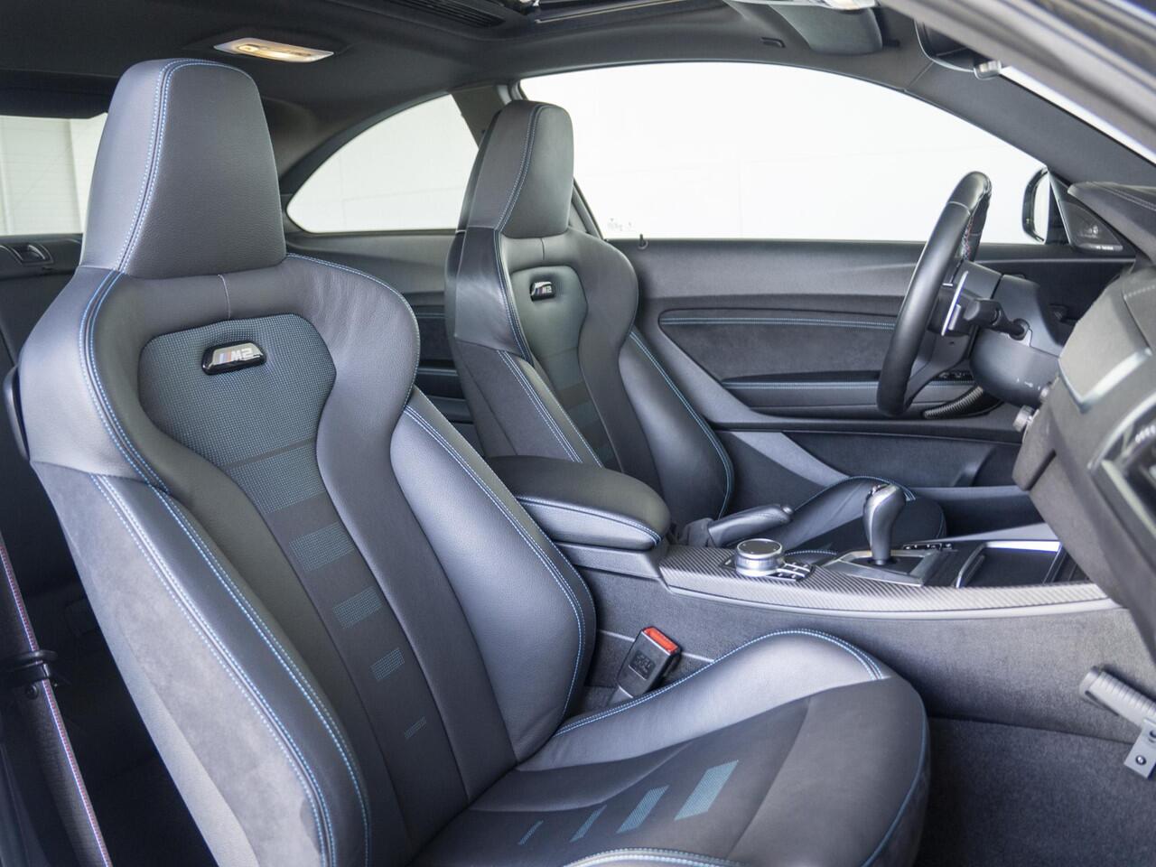 BMW M2 2 Serie Coupé Competition | M-Performance Carbon | 19'' | Comfort Access | Achteruitrijcamera | Schuif-/kanteldak | Stoelverwarming | Harman-Kardon | Remus Uitlaatsysteem