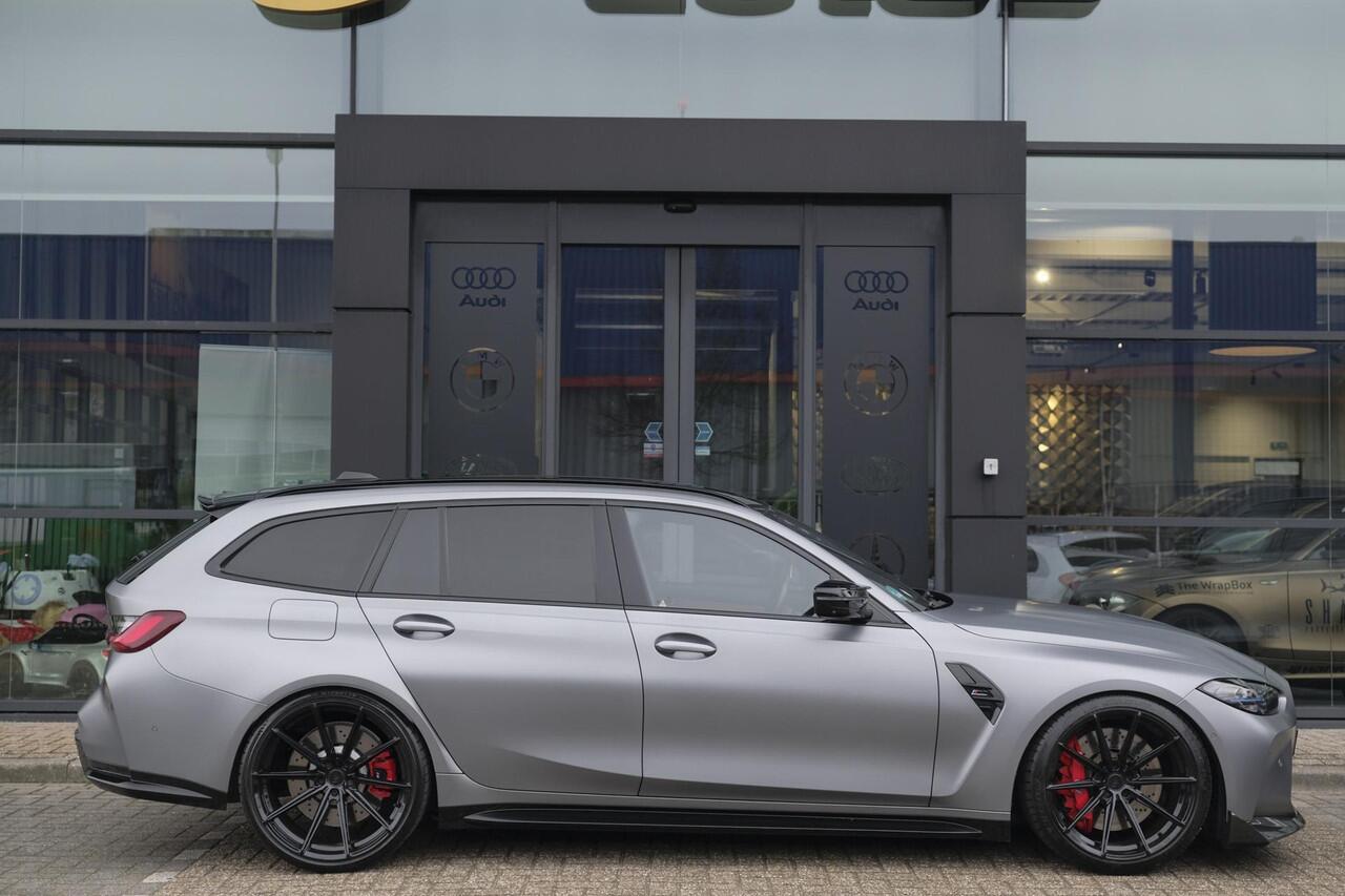 BMW M3 Touring Competition 510pk xDrive Widescreen Frozen grey *BTW* Head-up Adaptive cruise CSL grille 21" LMV