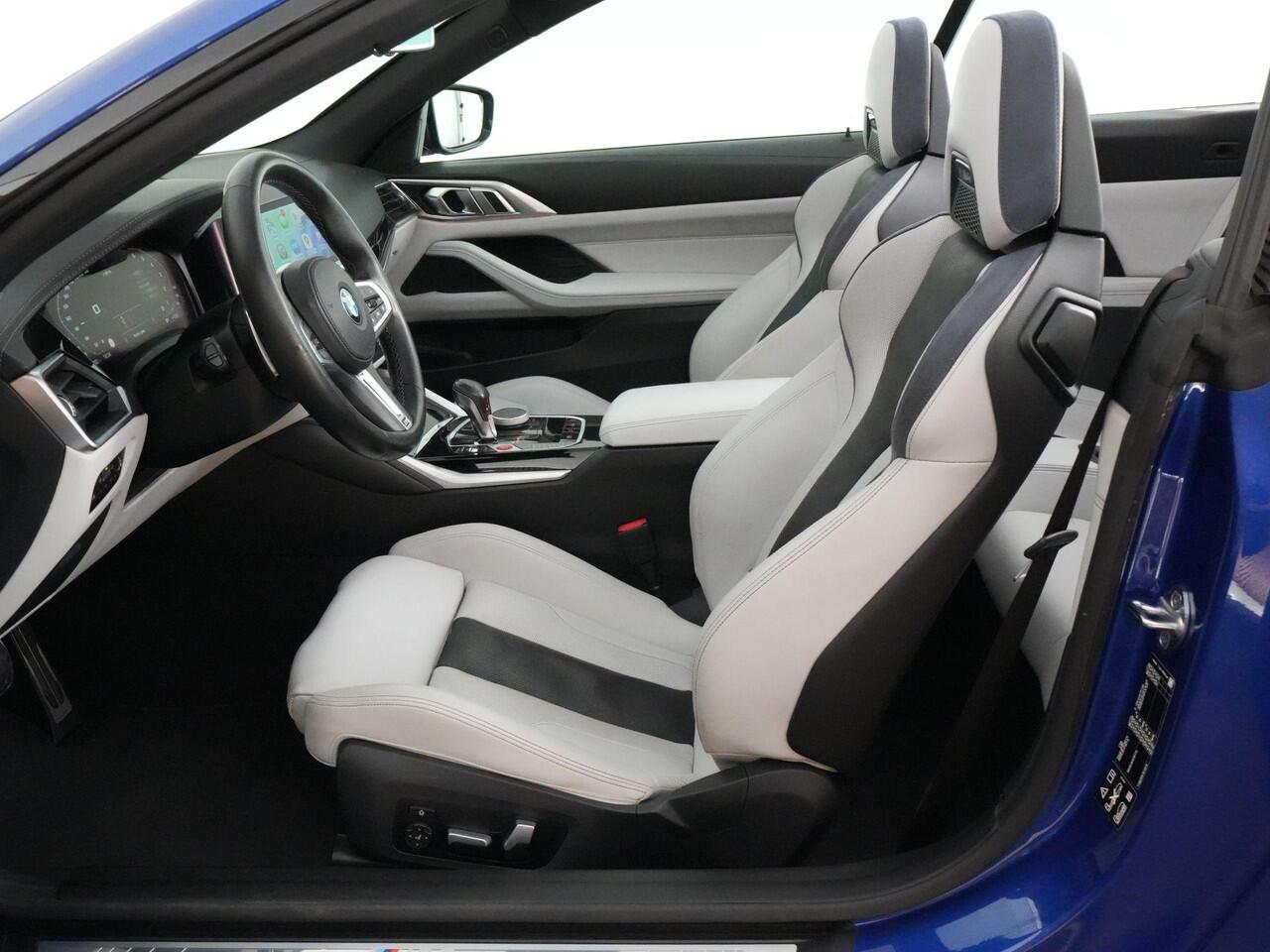 BMW M4 Competition Cabrio 510pk xDrive |dealer onderhouden|M-sport|M-sport stoelen|Laser LED|memory|360 camera|nekverwarming|sportuitlaat|HUD|blind spot|stoelventilatie + verwarming|