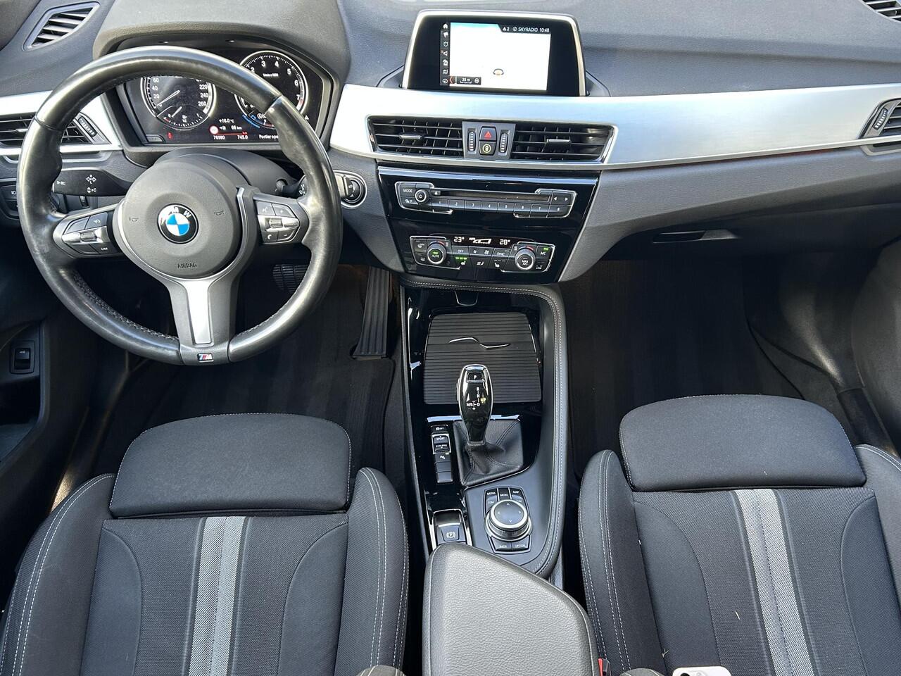 BMW X1 sDrive20i High Executive l Sfeer verlichting l Navi l Trekhaak l Electrische Klep