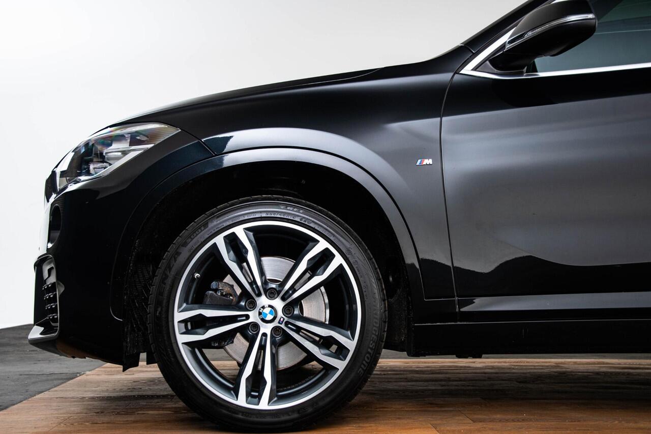 BMW X1 sDrive20i High Executive M Sport - Panoramadak - Comfort Access - Elektrisch verwarmde voorstoelen - HiFi - Verstelbare achterbank - Elektrische achterklep - LED koplampen - Koplampsproeiers -