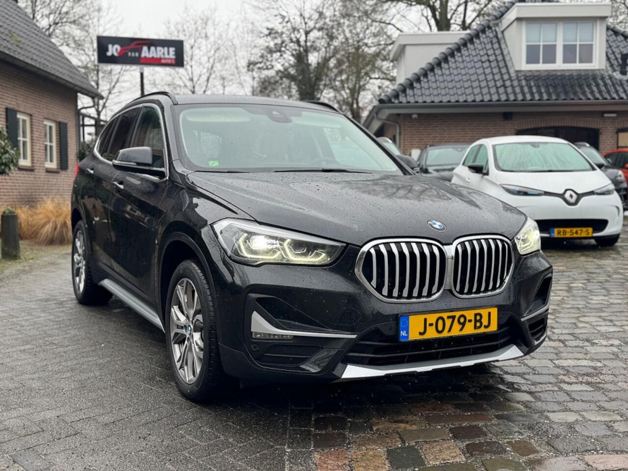 BMW X1 sDrive 2.0i 192pk autom ecc,beigeleer,lmv,navi,led,chroom,dglas,camera