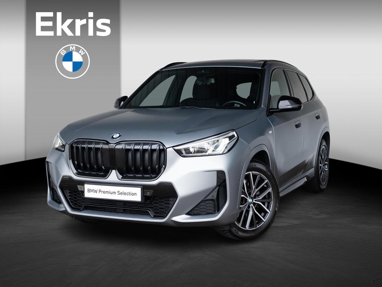 BMW X1 xDrive23i | M Sportpakket | Travel Pack | Achteruitrijcamera | Panoramadak | Stoelverwarming | 18''