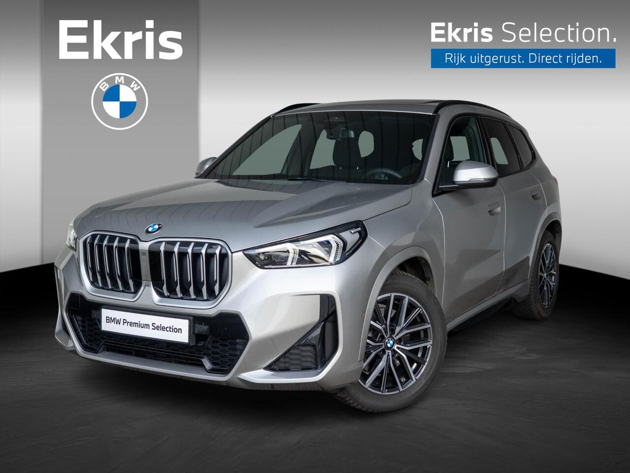 BMW X1 sDrive20i | M Sportpakket | Travel Pack | Verwarmd Stuurwiel | Comfort Access | Achteruitrijcamera | Panoramadak | Trekhaak | Ekris Selection