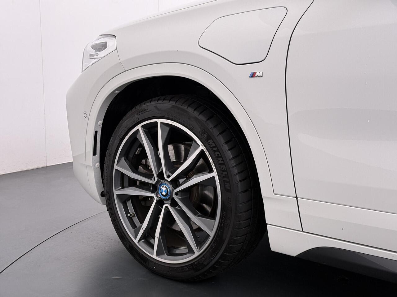 BMW X2 xDrive25e High Executive M-Sport | NAP | PHEV | Navigatie | 99% SOH