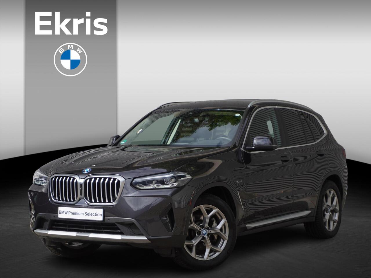 BMW X3 xDrive30e Trekhaak met elektrisch wegklapbare kogel | Parking Assistant Plus | Extra getint glas | 19 inch LM Y-spaak (Styling 693) in Ferric Grau