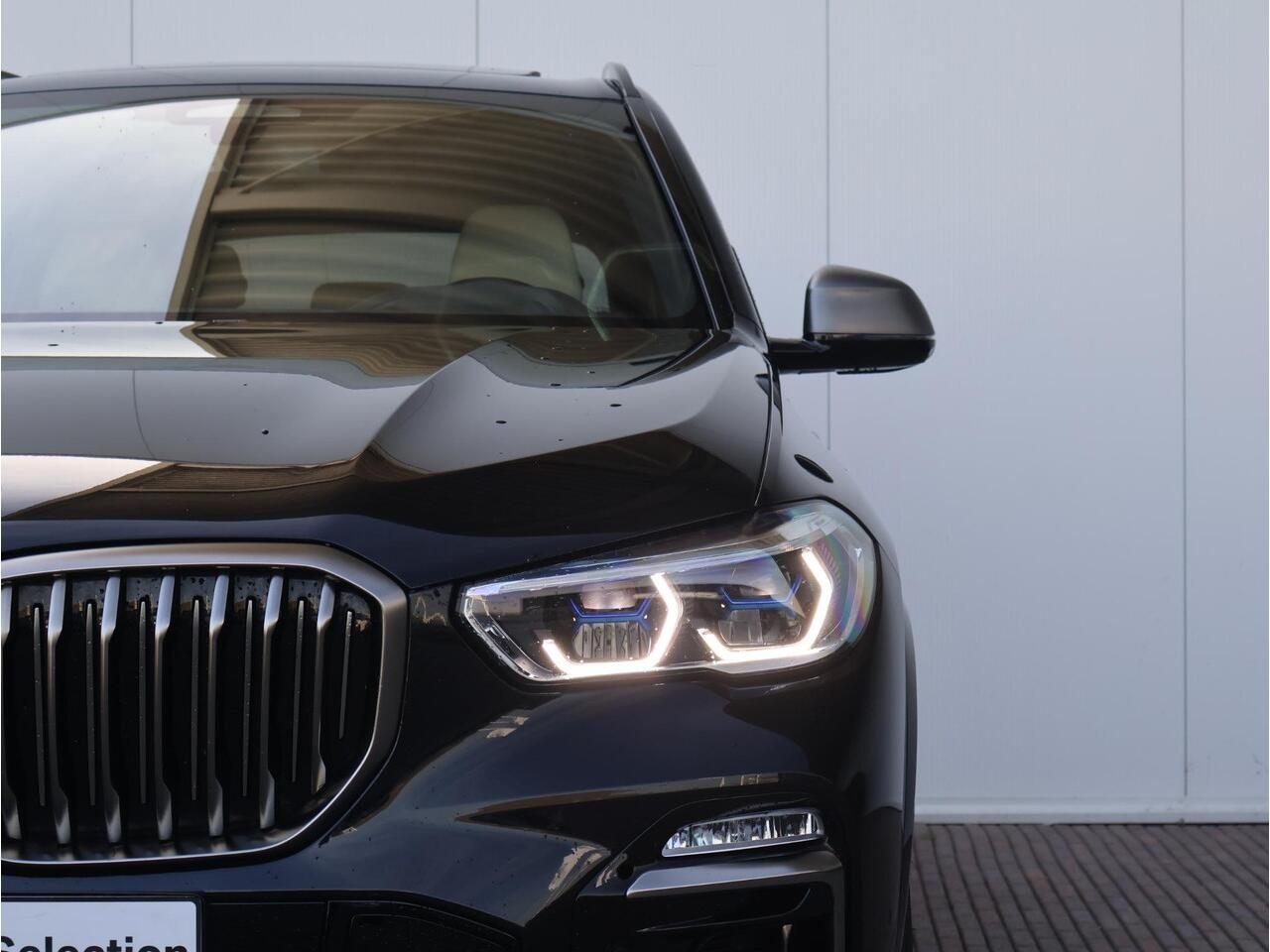 BMW X5 M50i High Executive Copilot / Trekhaak / Parkingass. + / Headup / Panodak / Achterasbesturing / Laserlight