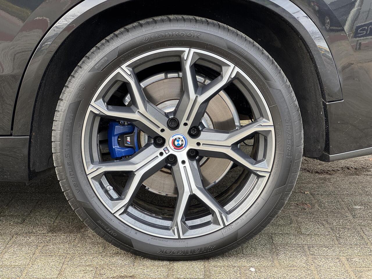 BMW X5 xDrive45e High Executive M Sport Pakket Automaat / Panoramadak / Active Steering / Trekhaak / Head-Up Display / Comfortstoelen / Laserlight / Driving Assistant Professional / 21 Inch / Luchtvering / Hifi / Craftedclarity / Shadow Line / M Sportremsysteem