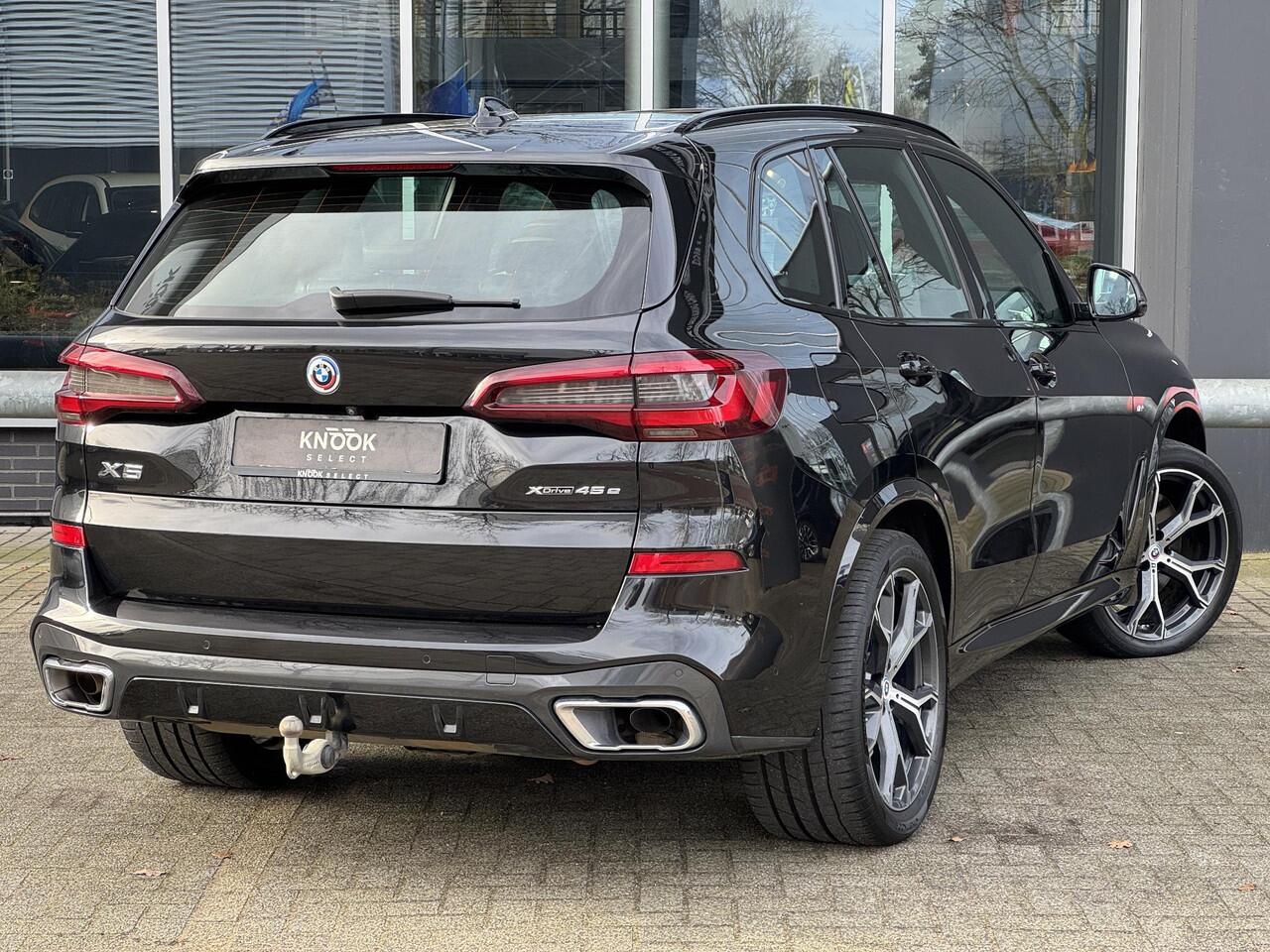 BMW X5 xDrive45e High Executive M Sport Pakket Automaat / Panoramadak / Active Steering / Trekhaak / Head-Up Display / Comfortstoelen / Laserlight / Driving Assistant Professional / 21 Inch / Luchtvering / Hifi / Craftedclarity / Shadow Line / M Sportremsysteem