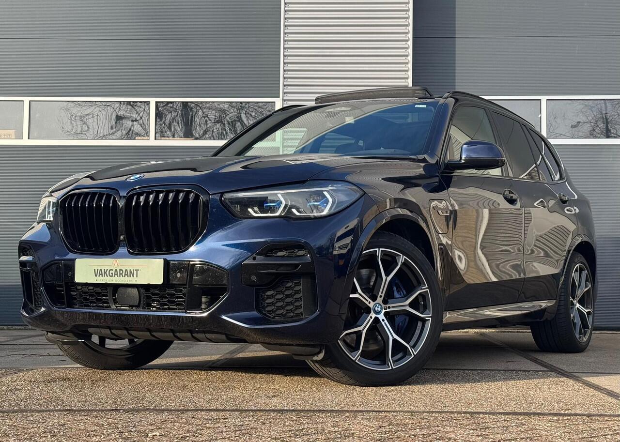BMW X5 xDrive45e High Executive |Pano |Achterasbesturing |M Perf. stoelen |Carbon inter. |Head-Up |H&K |360° |Massage |Stoelverkoeling |Sfeer