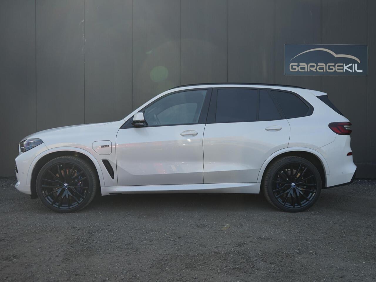 BMW X5 xDrive45e High Executive 1e Eig / Dealeronderh / Massage / Pano / achterasbesturing / Merino / Softclose / Ventilatie / 22inch / Laser / Parking prof / Driving prof